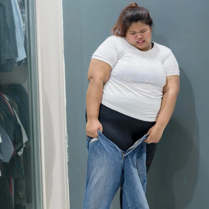 Person experiencing weight management challenges